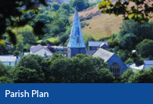 Parish Plan button, view of St Brannocks Church spire through trees