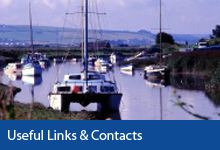 Useful Links & Contacts button, boats on the river Caen Braunton